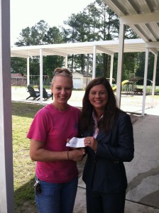 Julie Hathway presents check to Old Dock Elementary School principal Ronna Gore